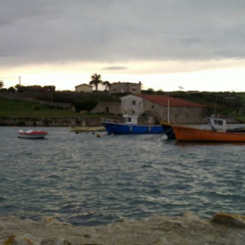 Imagen de barcos cercanos al molino